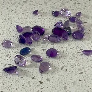 Beautiful amethyst purple heat treated gemstone lot of 30